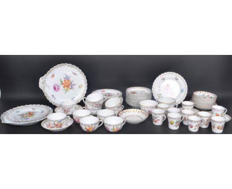 A large collection of early 20th century Dresden Spray bone china tea and coffee service to include teacups, saucers, side pl