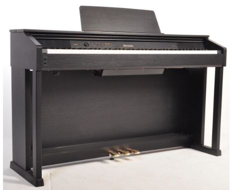 A 20th century Celviano Casio electric electronic piano. model no. AP-460. Having modelled string resonance, acoustic lid, Ha
