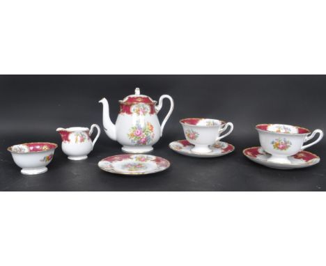 A vintage 20th century Shelley part tea service in the Duchess pattern comprising of milk jug, teapot, teacups, saucers and s