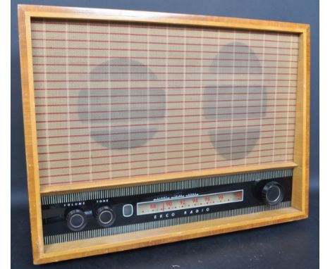 A retro vintage circa. 1960's Ecko valve radio within a teak veneer case with glass control panel and Bakelite dials. Model n