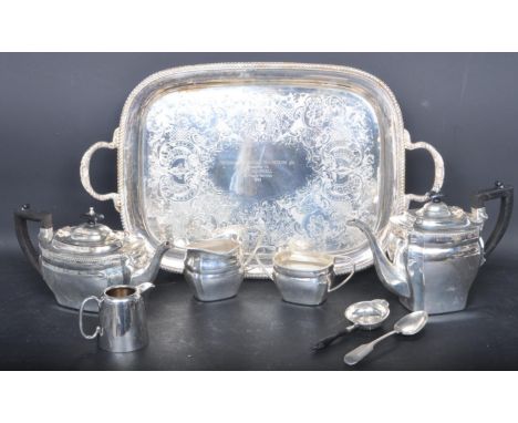 An Elkington silver plated tea service to include salver tray, teapot, coffee pot. creamer and sugar bowl. Marked Elkington P