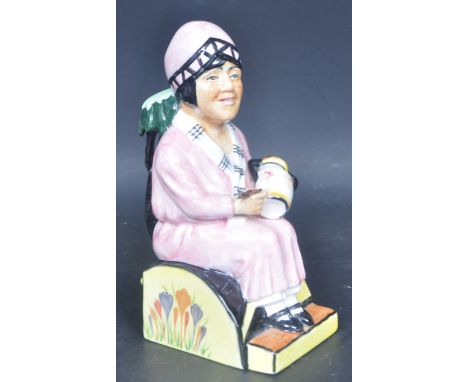 A vintage late 20th century limited edition ceramic figurine of Clarice Cliff by Kevin Francis. The figurine "Little Clarice"