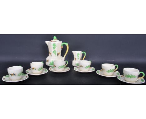 A Royal Doulton early 20th century tea service in the Gay lady pattern, Rd no 731190. The set comprising teacups, teapot, sau