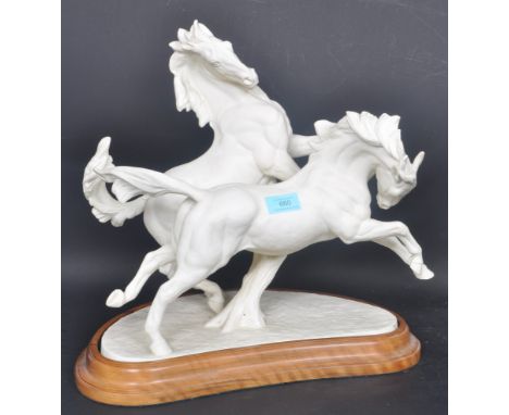 Royal Worcester - Doris Lindner - Galloping Horses - A large late 20th century Royal Worcester figurine in the form of a pair