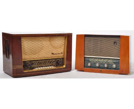 A pair of 2 retro vintage mid 20th Century wooden cased tube radio receivers. Models include Mazurka 56 &amp; Pye ltd Fen Man