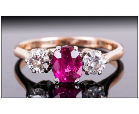 18ct Gold and Platinum Ruby and Diamond 3 Stone Ring, The Ruby of Excellent Colour. Marked 18ct and Plat. 