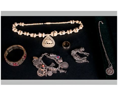 Small Quantity of Costume Jewellery including Continental souvenir charm bracelet in various grades of silver, ivory elephant