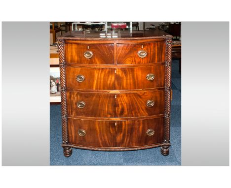 Regency Bow Fronted Chest Of Drawers with a reeded top edge & twisted column sides, 2 short drawers, below three long drawers