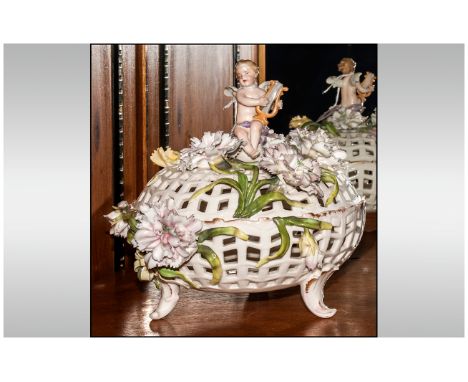 Austrian / German Fine 19th Century Reticulated Lidded Bowl, The Cover with a Figure of a Putto Seated Playing a Small Flute,