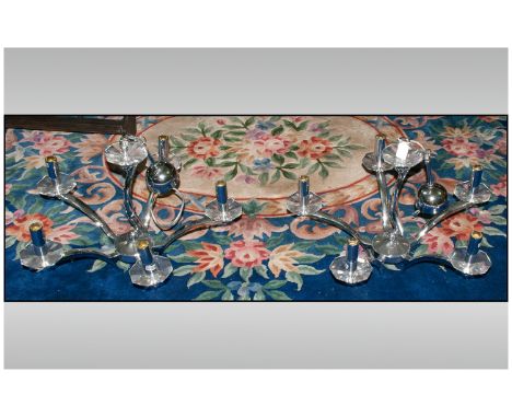 Pair Of Contemporary Chrome & Crystal Glass Chandeliers each with 5 branches with crystal sconces. Held by a shaped central c