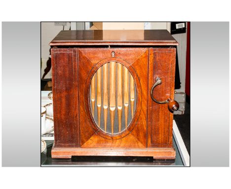 Hand Cranked Barrel Organ, playing 8 Airs. Simulated Organ Pipes to the front in an oval panel. With handle. String inlay to 