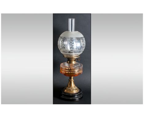 Victorian Oil Lamp with Glass Front, Funnel and Shade Double Burner Supported on an Embossed Brass Base, Terminating on a Bla