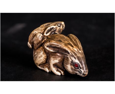 Japanese Finely Carved 19th Century Signed Ivory Netsuke, In The Form of a ' Hare and Baby ' In a Playful Mood. 2.25 Inches W