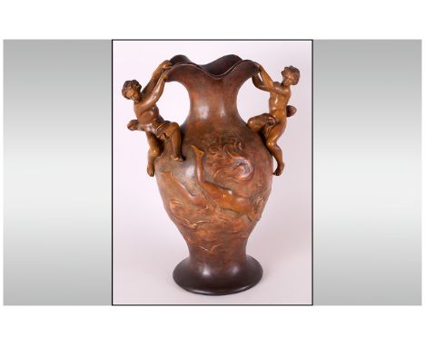 Goldscheider Art Nouveau Terracotta Vase, signed Kinsburger, the ovoid body decorated with a nude female floating amongst swi