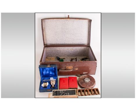 Vintage Suitcase containing assorted collectables including domino set, corkscrew, leather tape measure, Yorkshire Bank  etc