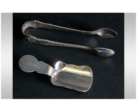 Walker and Hall Silver Caddy Spoon. Hallmark Chester 1914. 3.5 Inches + a Pair of Silver Sugar Nips. Hallmark Sheffield 1906.
