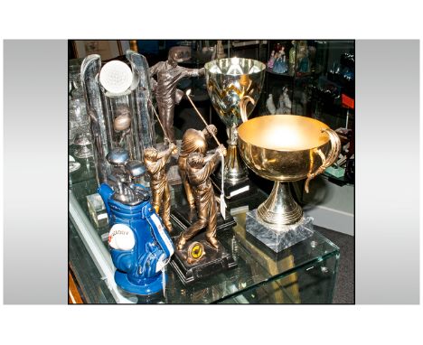 Golfing Interest comprising three golfing figures on square plinths, Tea Caddy Porcelain novelty teapot and Glass Trophy. Plu