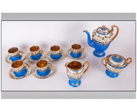 Japanese Coffee Set, Blue Ground With Gilt Enamelled Decoration, Comprising Six Coffee Cans And Saucers, Lidded Sugar, Cream 