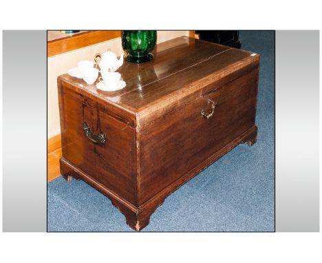Georgian Silver Type Chest In Mahogany with walnut cross banding on bracket feet, with bronze carrying handles to the side an