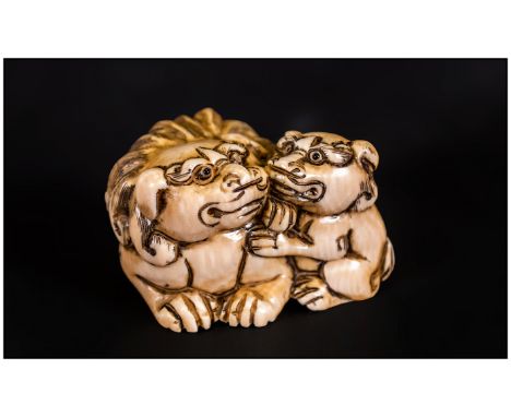 Japanese Finely Carved Ivory Netsuke, In The Form of A '  ' 'Mythical Animal and Its Offspring' In a Playful Mood. c.1890. 1.