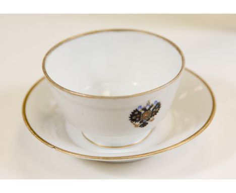 [NICHOLAS II]: (1868-1918) Emperor of Russia 1894-1917.A fine white glazed china cup and saucer, each with the green factory 