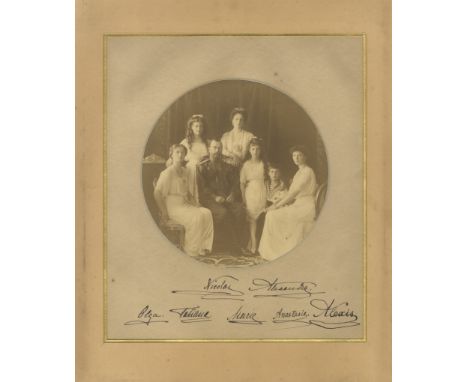 RUSSIAN IMPERIAL ROMANOV FAMILY: An exceptional vintage signed sepia 10.5 x 12.5 photograph by all seven members of the Russi