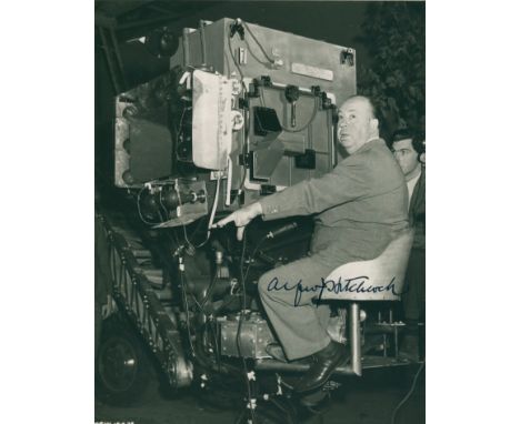 HITCHCOCK ALFRED: (1899-1980) British Film Director. A superb vintage signed 7.5 x 9.5 photograph of the director seated in a