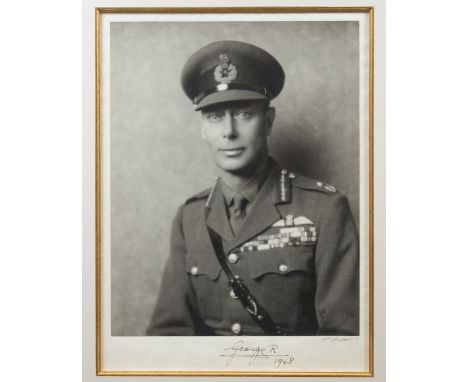GEORGE VI: (1895-1952) King of the United Kingdom 1936-52. A very fine vintage signed 12.5 x 16.5 photograph, the image depic