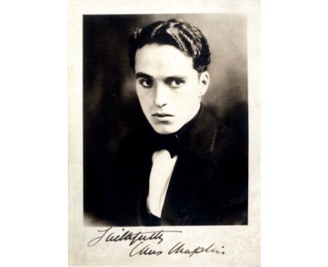 CHAPLIN CHARLES: (1889-1977) English Film Comedian, Academy Award winner. A very fine vintage signed sepia 5 x 7 photograph, 