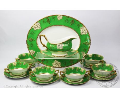 A 19th century Staffordshire part dinner service, comprising six bowls and saucers, sauce boat and stand and platter, with vi