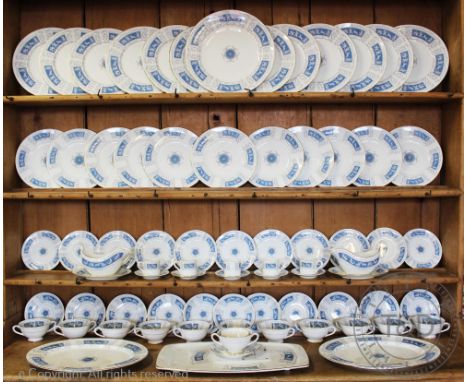 An extensive Coalport Revelry pattern dinner service comprising; twelve dinner plates, eleven entree plate, eleven side plate