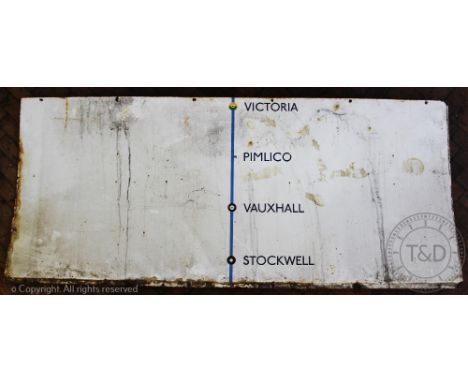 A vintage London Underground large enamel sign, showing four stations on the Victoria line from Victoria to Stockwell, 84.5cm