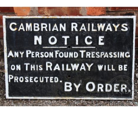 A cast iron Cambrian Railway station sign,  45cm x 69cm, with another cast iron sign (worn) and an enamel sign (3)