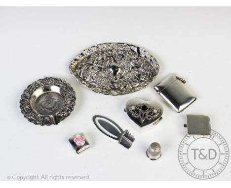 A selection of small silver, to include; A silver navette shaped dish Nathan and Hayes Chester 1897, with embossed scrolling 
