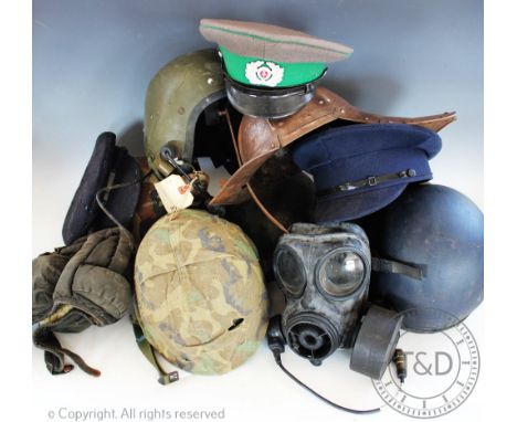 A quantity of military and other helmets, WWII and later, to include; Army, RAF, ARP and further helmets to include a lobster