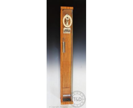 A modern Kieninger olive wood veneered and glass regulator type wall clock, oval dial with Roman numerals and skeleton moveme