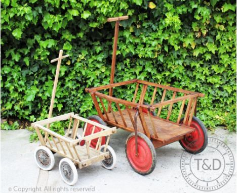 A Vintage dog cart, stamped 'Gluco', 59cm H x 90cm W x 73cm D, with a similar smaller example (2)