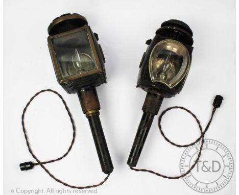 Two coaching lamps, enclosing a horseshoe panel example, 40cm high (2)Provenance: Clynog Farmhouse, North Wales CONDITION REP