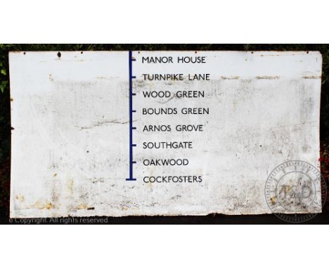 Two vintage London Underground large enamel signs for the Picadilly Line, the one showing stations from Manor House to Cockfo