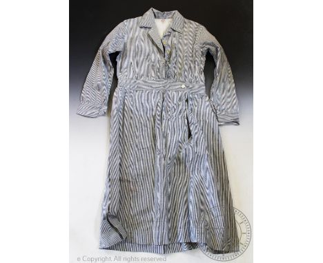 A collection of early 20th century clothing, to include; a black crepe two piece skirt and jacket, the jacket with appliqué s