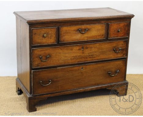 A George III oak chest, of three short and two long drawers, on bracket feet, 75cm H x 93cm W x 42cm DProvenance: Clynog Farm