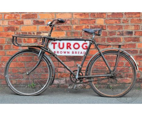 A Vindec vintage grocers delivery bicycle, with perspex advertising plate for 'Turgo Brown Bread', 102cm high