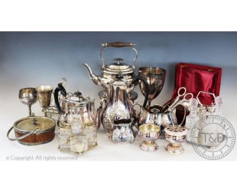 A selection of silver plated wares to include a case christening mug of coopered barrel form, 10cm high, two cruet stands, a 