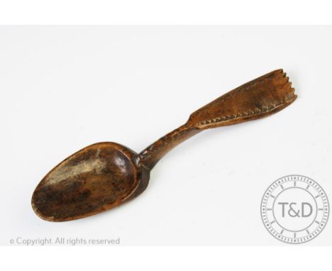 A Welsh 18th /19th century vernacular treen crawl spoon,  with combination spoon and fork, 18cm longProvenance: Clynog Farmho