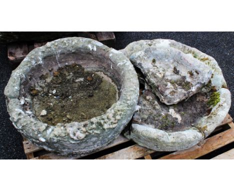 A 19th century rustic stone circular trough, 71cm diam, and one other circular trough in two sections (at fault)Provenance: C