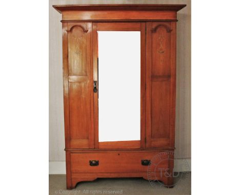 An Edwardian walnut single door wardrobe, 198cm H x 135cm W and a similar mirror back dressing table with three drawers, 147c