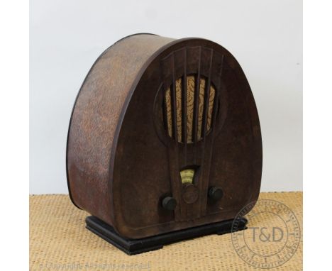 A Philips Art Deco radio, with faux walnut case, 44cm high CONDITION REPORT: This lot is sold as decorative item only, prospe