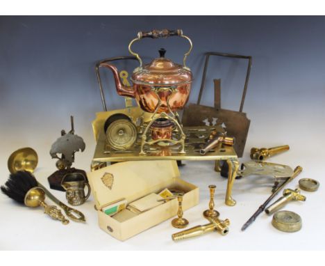 A miscellany of 19th century and later metal wares, to include two iron and brass teapot stands,  a copper kettle on brass st