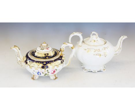 A Coalport florally enamelled blue and gilt teapot, feint pattern number to base '2495', upon four gilt highlighted and folia