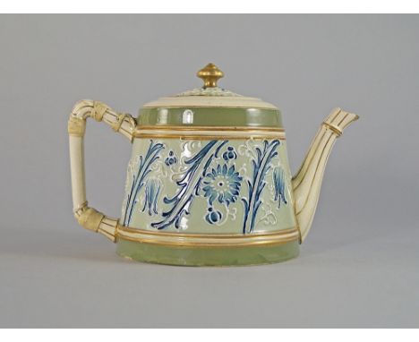 A Macintyre Moorcroft Florian ware teapot, floral and foliate tube lined decoration between two olive green bands, on a cream